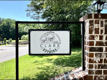 a metal sign that is for a business