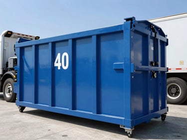 Low-angle heroic shot of a clean, branded 40-yard roll-off dumpster with a heavy truck in the background, bright California daylight, sharp focus.