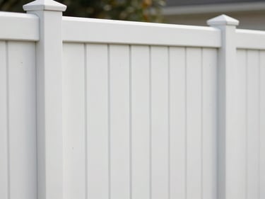 Smooth, clean white vinyl privacy fence section, showing weather-resistant material texture, under bright morning daylight.