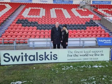 Branded sponsorship pitch banner and backdrop graphic design for Switalskis