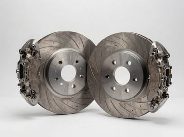 KIA brake disc and caliper assembly arranged on a white surface under clean studio lighting, sharp product photography showing rotor venting detail, no shadow cast on background