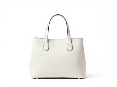 Minimalist structured leather handbag on a clean white studio background, high-key lighting, sharp focus, premium editorial feel