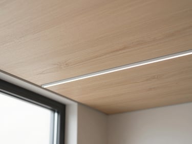Matte-finish heavy-gauge PVC ceiling boards mimicking natural timber, sharp focus.
