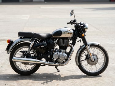 Royal Enfield Classic 350 in three-quarter front angle on concrete floor, north-facing daylight, chrome details and spoke wheels visible, no rider