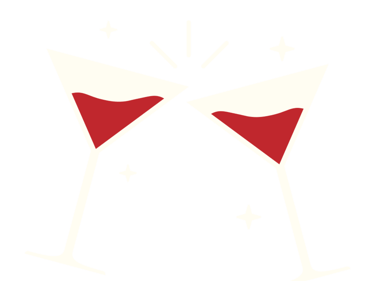 Deux verres à martini remplis de cocktails rouges qui s’entrechoquent lors d’un toast festif, avec d
