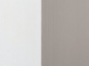 Macro shot of a perfectly aligned wallpaper seam, showing intricate pattern matching and no visible edges, natural daylight.