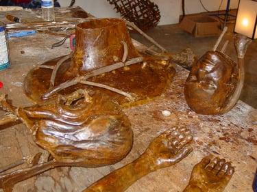 the wax pieces having runners and risers attached