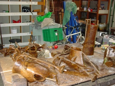 the wax pieces having runners and risers attached