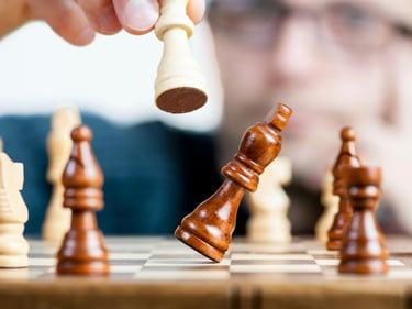 Chess board with player achieving checkmate, symbolizing strategy and foresight