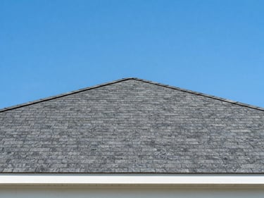 New asphalt shingle roof on a modern Huntsville home, bright daylight, crisp lines, blue sky