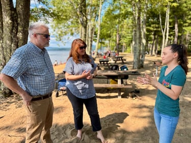 Tim, Senate President Mattie Daughtry and child care worker chatting at Sebago Lake State Park 
