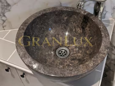 Раковина з дідковицького граніту
