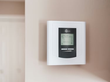 A programmable thermostat which is helpful ijn lowering utility bills.