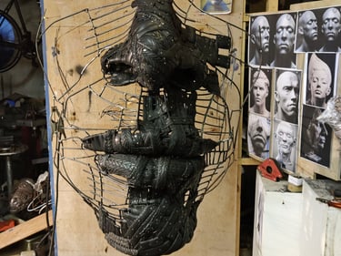 'Covid', commissioned by Feile Na Bealtaine festival. Recycled bike tyres,steel and fabric.