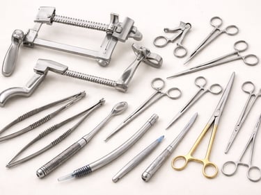 Thoracic surgery instruments including retractors, forceps, and scissors on a white background.