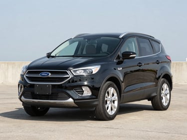 Three-quarter front view of a clean 2018 Ford Escape in black on a bright outdoor lot under even daylight, neutral asphalt background, no people