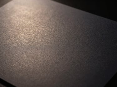 Close-up of a discreet, official-looking document, subtle texture, dark background, professional lighting.