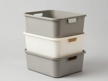 Stacked heavy-duty modular storage bins in warm gray and chalk white, studio lighting