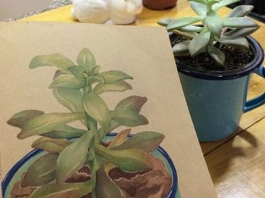 ilustracion de una planta en base de posillo de metal azul