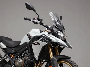 45-degree quartering studio shot of a 200cc adventure-commuter motorcycle, neutral grey background, studio key light revealing front fork and headlight cluster detail
