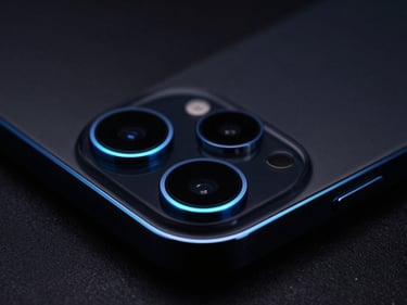 Sleek black smartphone, close-up macro detail of camera array, electric blue rim-lighting, dark premium product photography, 8k