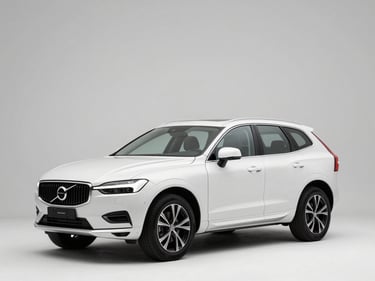 Front three-quarter driver-side profile of a white Volvo XC60, studio strobe lighting, full vehicle visible, squared frame, clean background