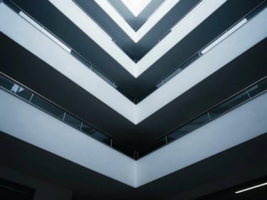 Architectural shot of a modern government building interior, clean lines, clinical white light, high contrast