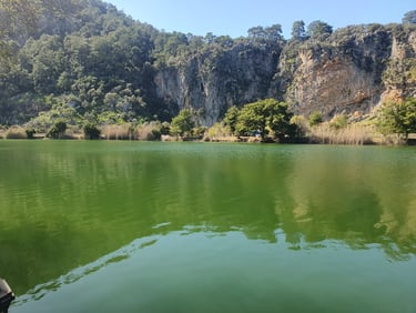 Dalyan river with a mountain in the background