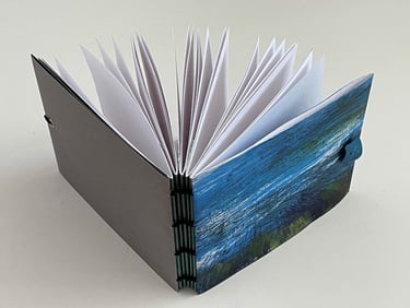 Soft cover Coptic binding with bead closure