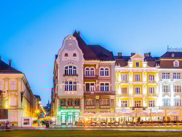Colorful Buildings Under Blue Sky in Timisoara