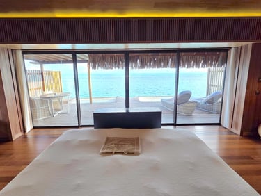 Conrad Resort Bora Bora overwater villa bedroom
