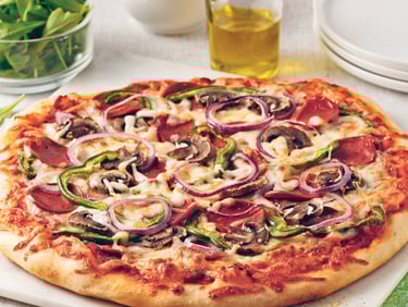 a pizza with a slice missing from the pizza