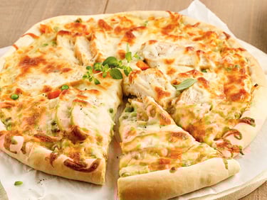 a pizza with cheese and sauce on a wooden table