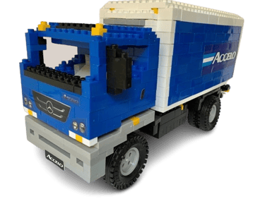 a blue truck with a lego - like truck in the back mercedes benz CorpoRASTI Regalos empresarios