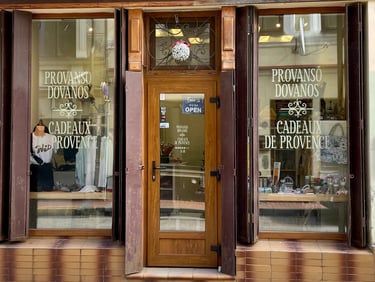 a gift store on a sidewalk