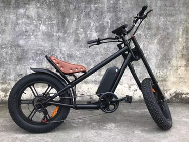 a black and white motorcycle with a brown seat