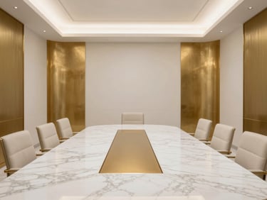 Symmetrical shot of a high-end corporate boardroom in Riyadh, minimalist design, white marble table, soft diffused daylight, warm gold accents.