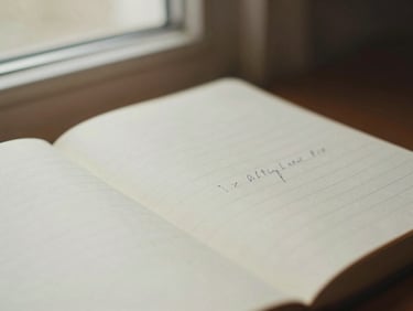 Close-up of a physical ledger with neat handwriting, soft window light
