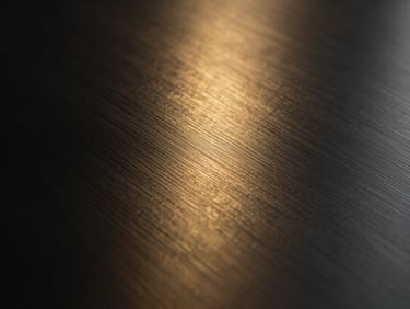 Abstract golden light reflections on a dark metallic surface, evoking a sense of premium finance, high contrast, 35mm lens