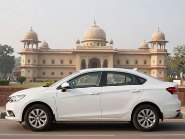 A spotless white sedan parked near a historic heritage building in Punjab, warm morning light, clean composition.