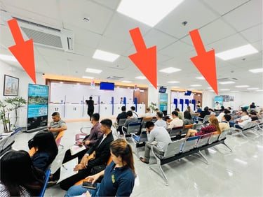 alt="digital advertising inside visa processing center waiting area"