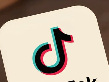 A vertical-format TikTok ad frame screenshot, capturing a clear visual hook, presented on a warm cream card.
