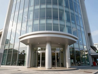 Sleek commercial podium in Penang, clean glass facade, natural afternoon light