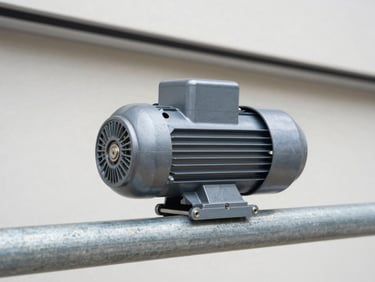 Close-up of a modern belt-drive garage door opener motor attached to a steel rail, bright natural daylight.