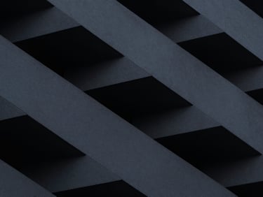 Abstract architectural geometry, dark, angular, fragmented, minimalist fine art photography, high-contrast cool ambient lighting, deep graphite tones, sharp architectural lines, 35mm lens