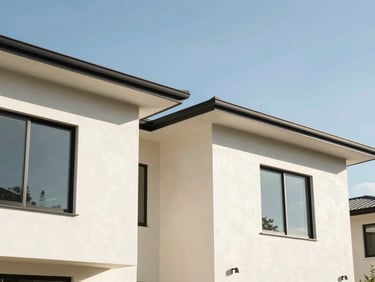 Architectural photograph of a modern residential exterior under a bright Bay Area sky, showing crisp paint lines and clean details, 35mm lens.