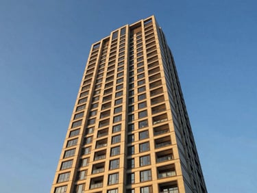 Low-angle architectural exterior of M3M Golf Estate, Gurugram, modern high-rise, golden hour sunlight, deep blue and warm gold tones, wide-angle, luxury architectural photography, 35mm