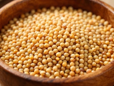 Close-up of golden yellow mustard seeds in a rustic wooden bowl, natural sunlight, rich amber tones, shallow depth of field, 35mm
