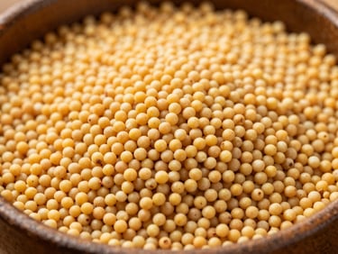 Macro shot of golden yellow mustard seeds in a rustic bowl, natural sunlight highlighting texture.