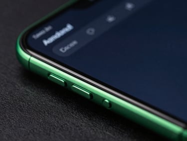 Extreme close-up macro shot of a sleek Android device displaying a clean dark-mode terminal interface, neon green rim lights reflecting off the curved glass edge, sharp focus